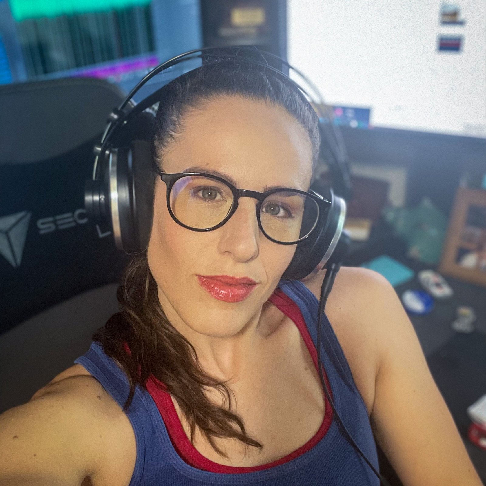 6 Reasons Why Hiring a Professional Voiceover Artist Is a Smart Investment for Your Brand (Yes, Even In The Age of AI...) 2 Female voiceover artist Shannon Scott wearing professional headphones .