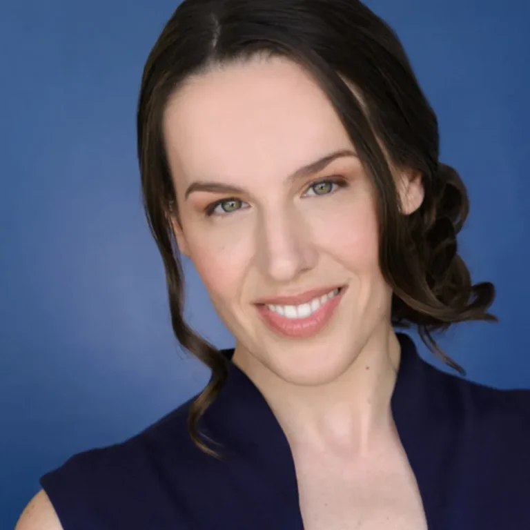 Professional voice actor smiling in a business portrait for contact and bookings