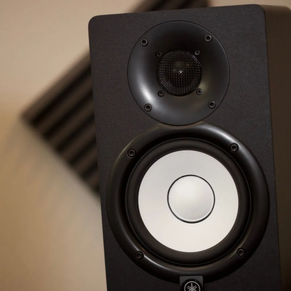 Yamaha HS5 studio monitors used for precision playback in professional voiceover production