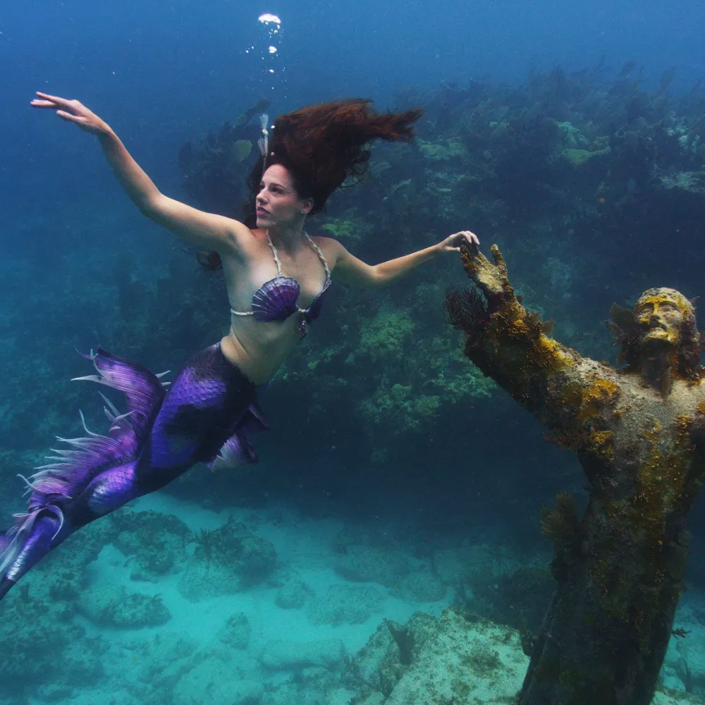 Professional Performance, Movement & Visual Storytelling 6 Shannon Scott modeling underwater in the clear ocean waters of the Florida Keys, showcasing elegance and natural beauty.