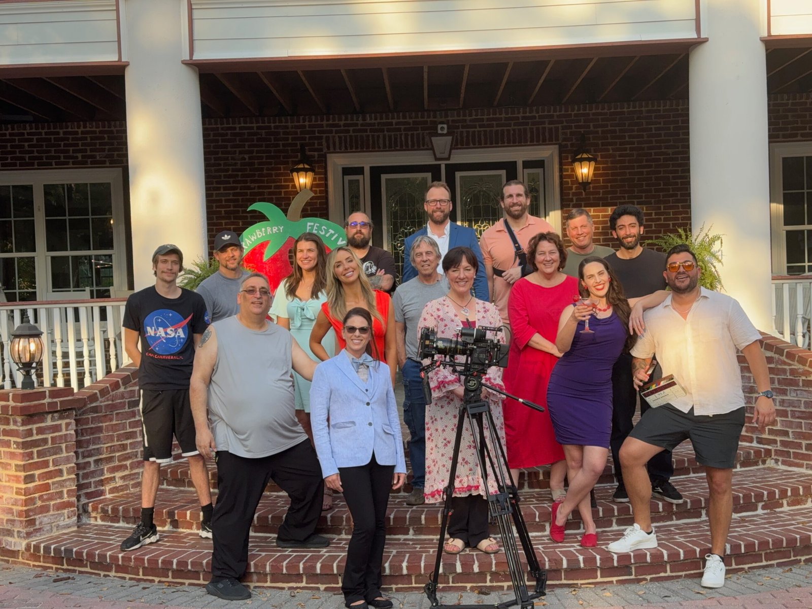 The Bright Stars Greenroom 1 Group of actors and creatives smiling and embracing on set after wrapping a day of filming at The Bright Stars Greenroom Retreat
