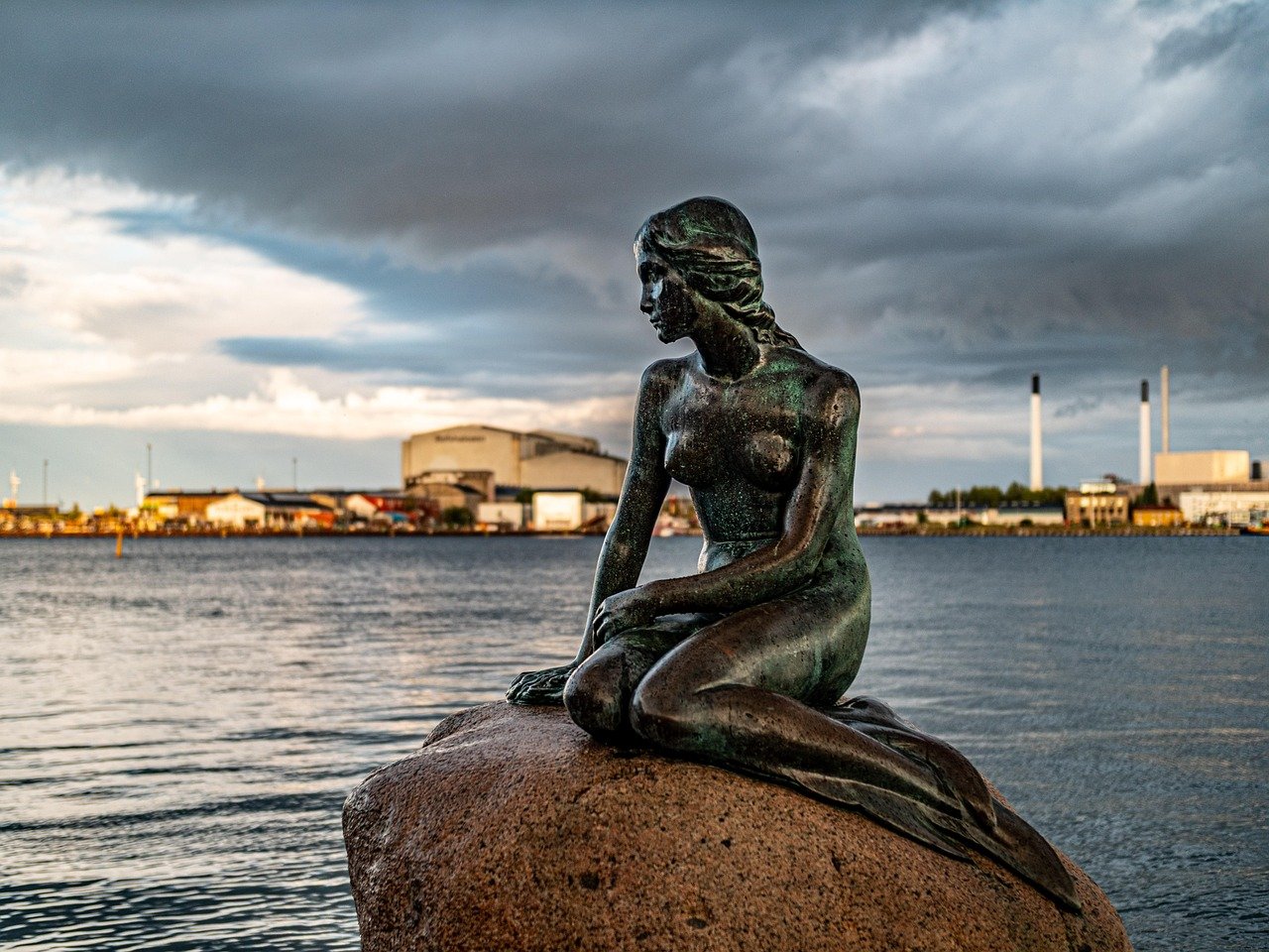 Elegant mermaid statue representing mermaids in film and culture, symbolizing fantasy and storytelling.