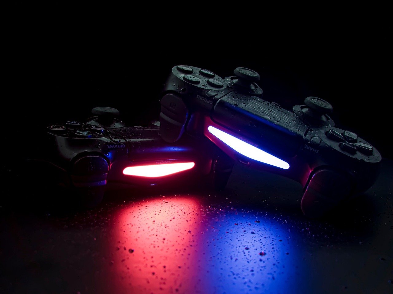 Video game controllers symbolizing character voice development in interactive media