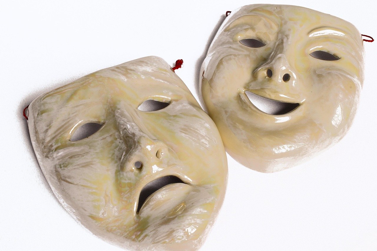 Breaking Free from the Struggling Actor Mentality: Embrace an Abundance Mindset to Chase Your Dreams 3 Comedy and tragedy masks representing the emotional range of an actor transformation journey