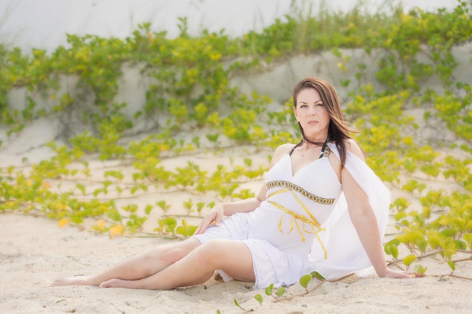 The Power of Being Seen: How Presence Transforms Everything 4 Goddess-like woman on the beach, captured in golden light to symbolize transformation, photographed by Shannon Scott.