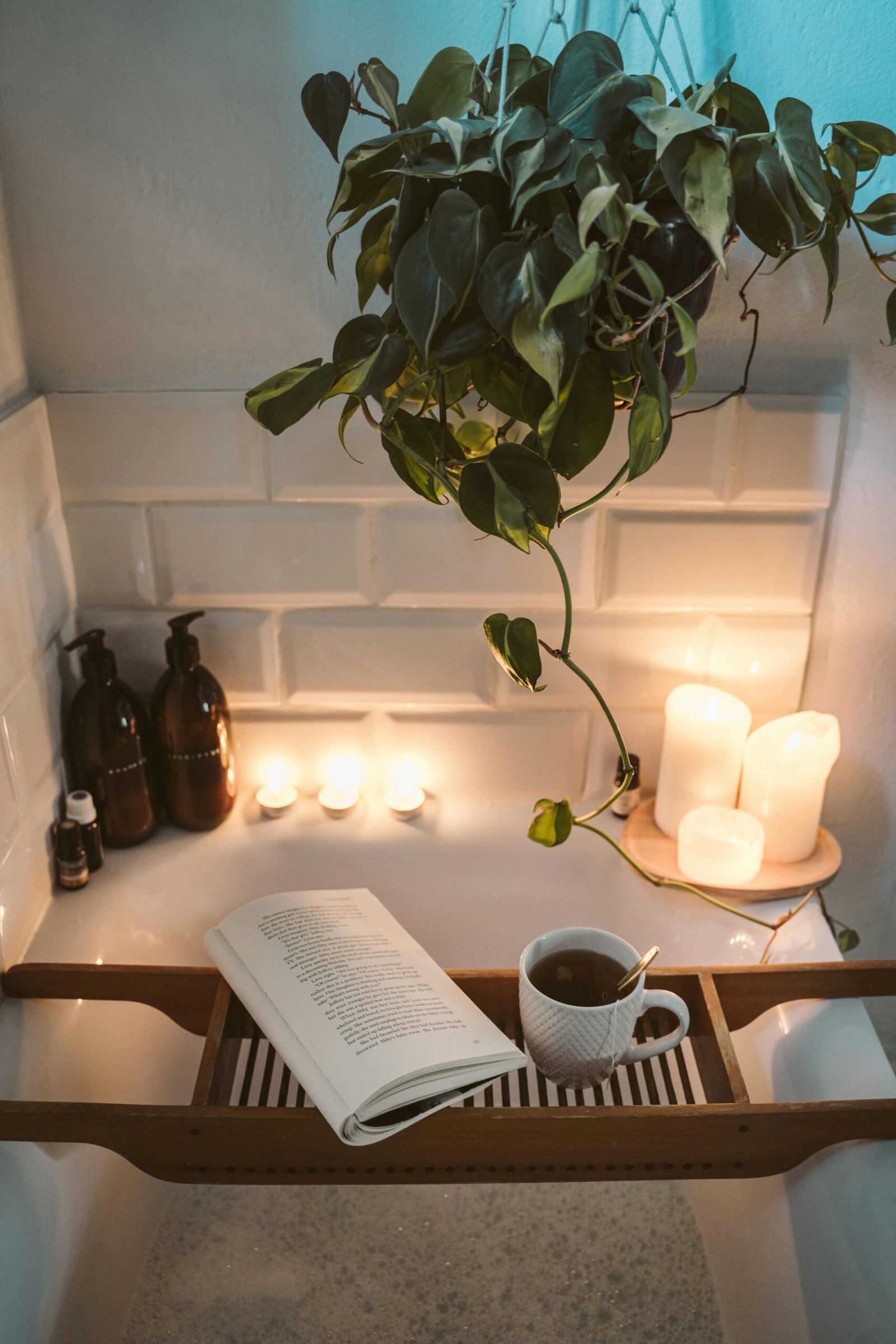 3 Fall Self-Care Rituals for Creatives (and Why We All Need a Little Magic Right Now) 3 Lit candles around a warm bath, creating a peaceful atmosphere that represents self-care for creatives