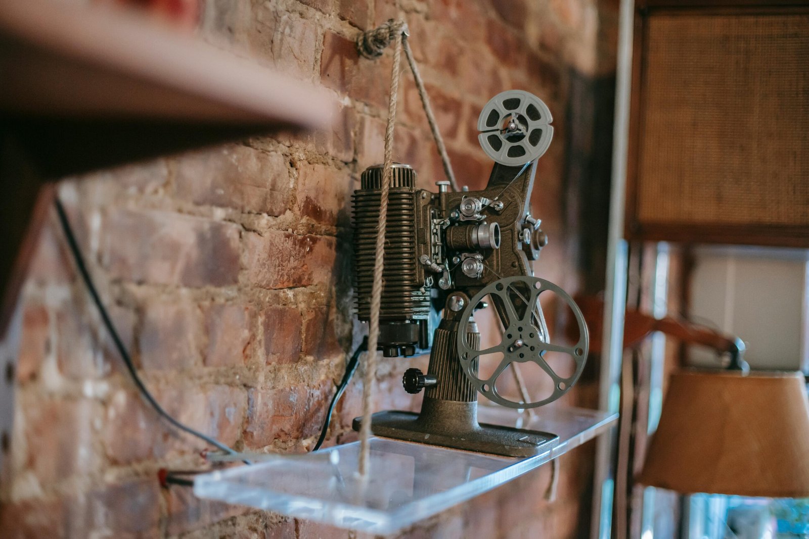 Vintage film recorder instrument symbolizing the musical and cultural influence of mermaids in pop culture.

