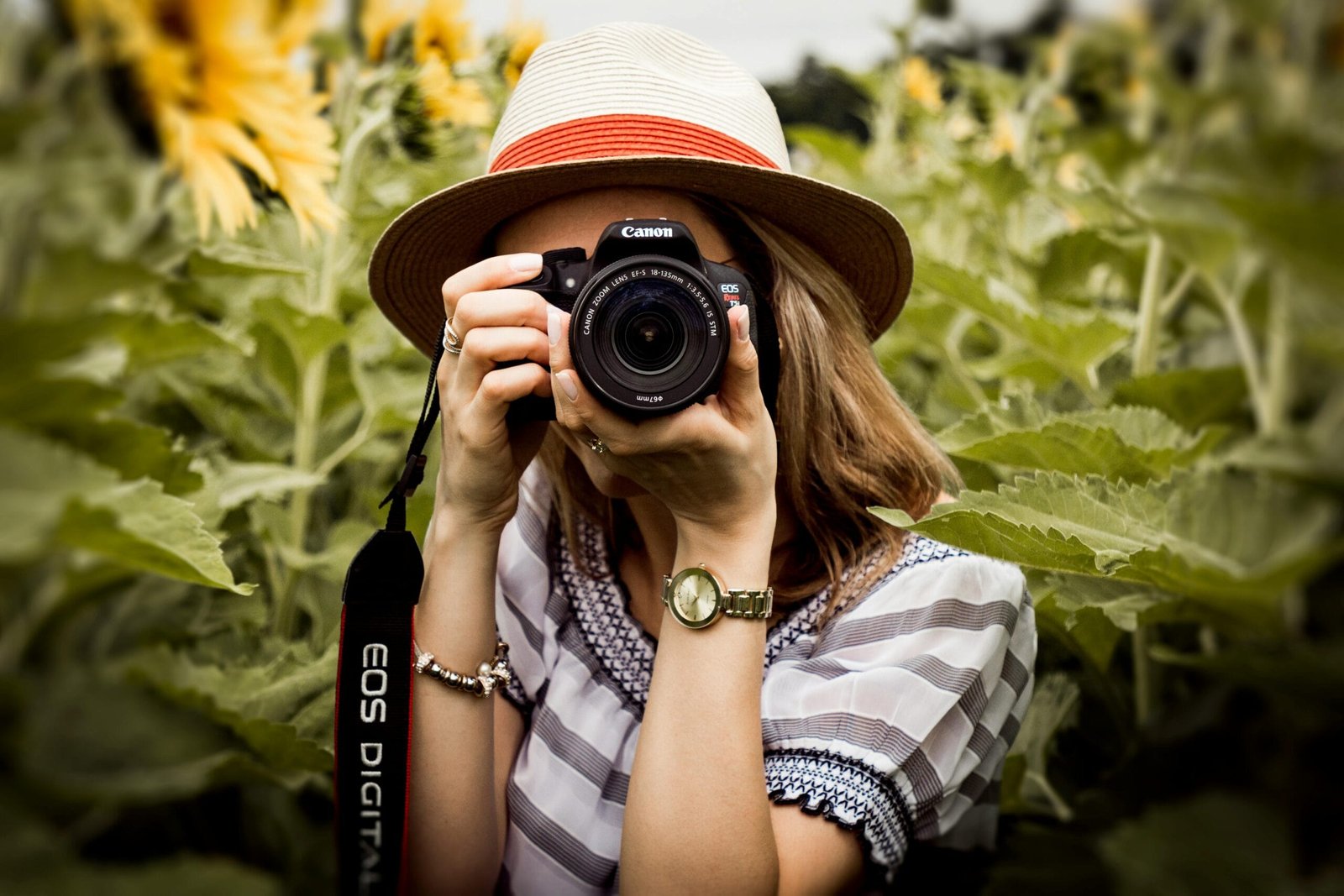 Photographer taking a photo, highlighting the importance of checking photographer reviews before a shoot.