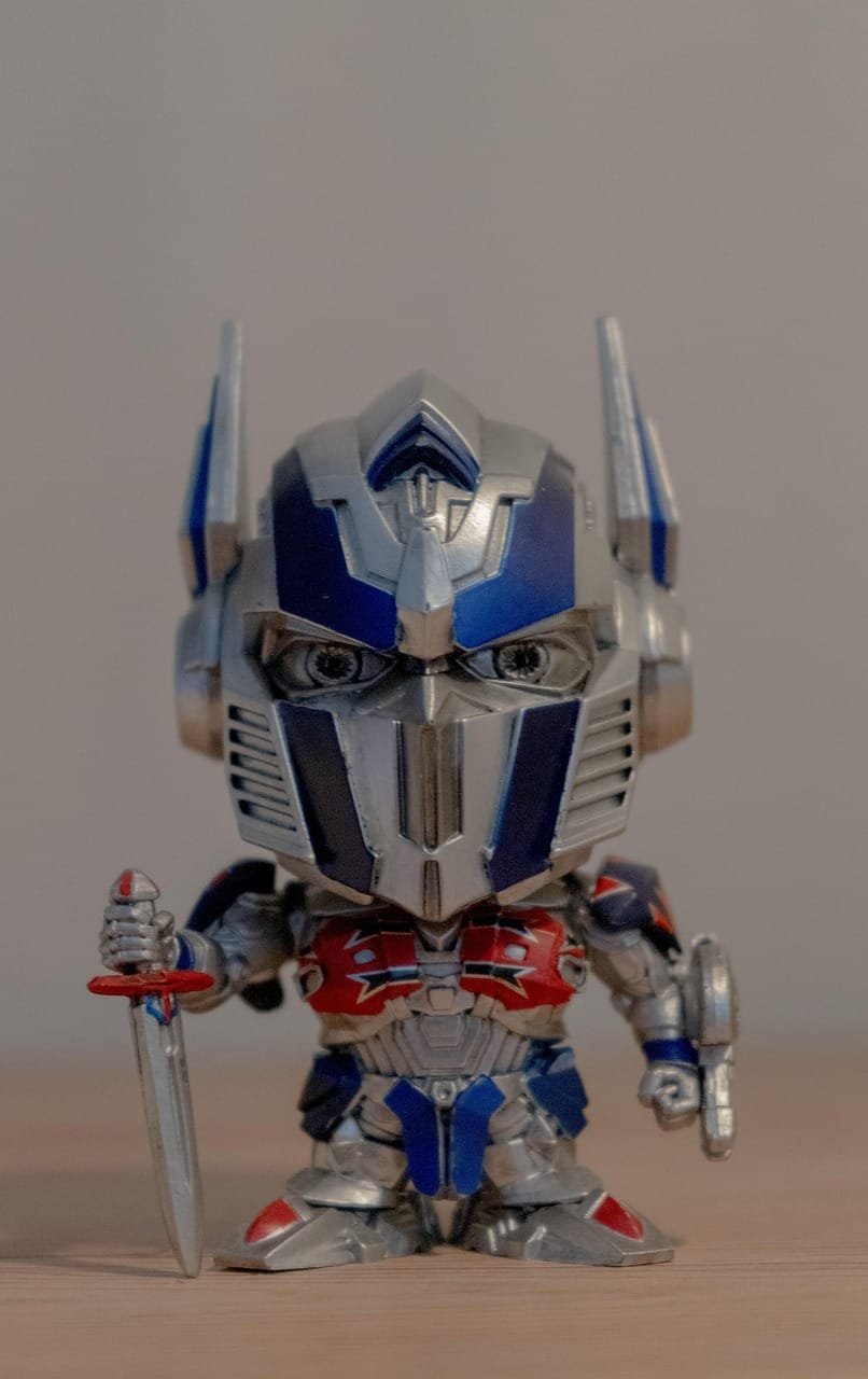 The Magic of Becoming: What Halloween Teaches Performers About Transformation 1 A close-up photo of a colorful transformer toy symbolizing voice actor transformation, creativity, and the power of stepping into new characters.