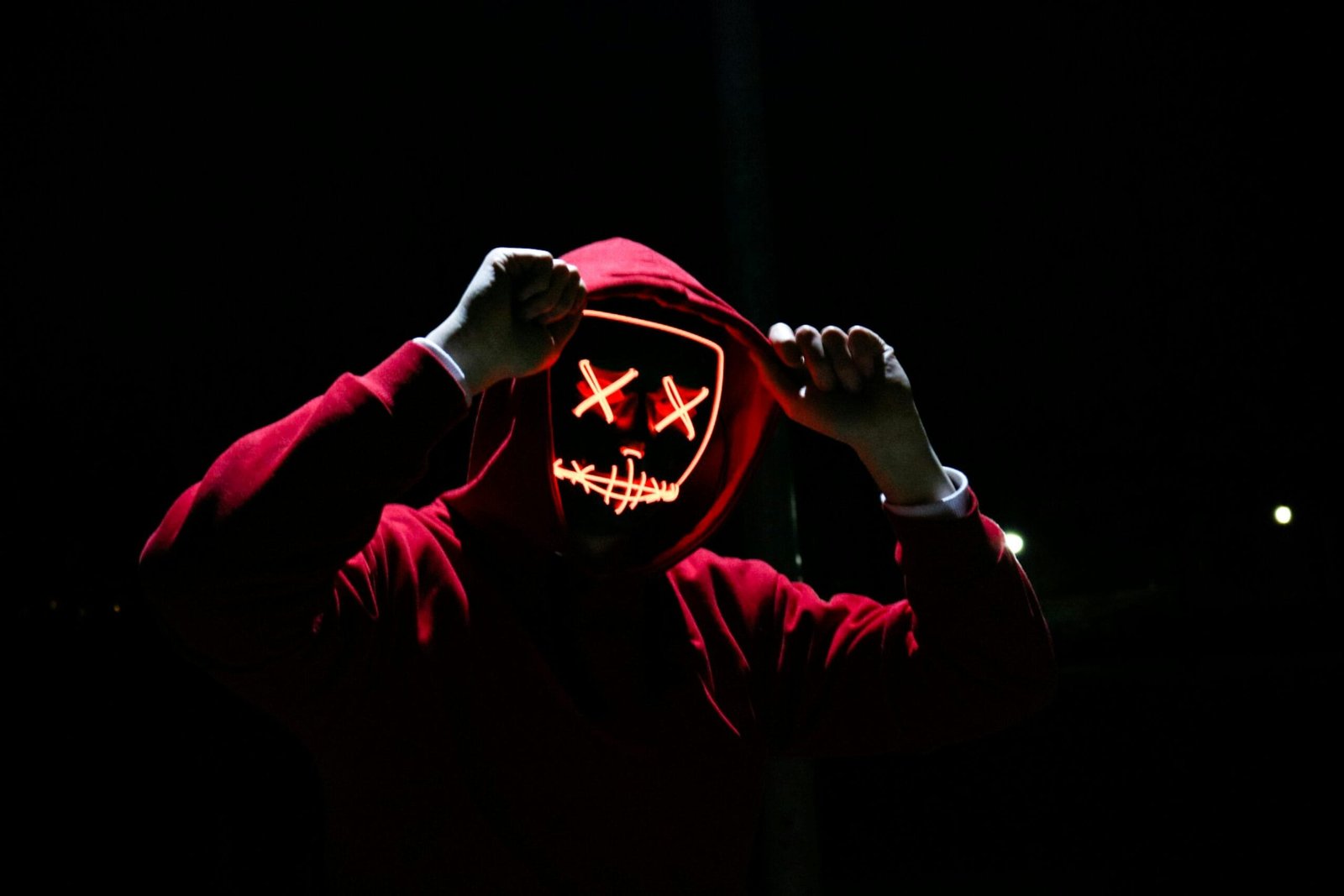 The Magic of Becoming: What Halloween Teaches Performers About Transformation 2 A person wearing a theatrical mask representing character development, transformation, and the process of becoming another persona.