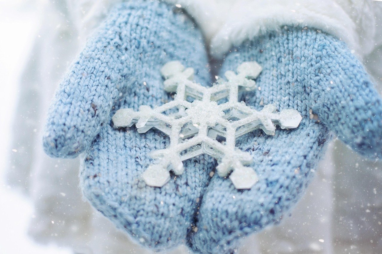 Holiday Voiceover Services: 5 Powerful Heartfelt Tips for Every Recording 1 Seasonal voiceover projects inspiration with mittens holding a delicate snowflake