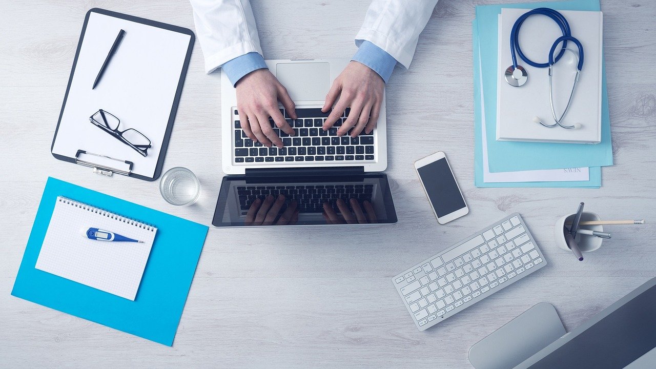 Doctor working on laptop for medical eLearning voiceover content, business, typing, keyboard, laptop, doctor, medical care, desk, doctor, doctor, doctor, doctor, doctor