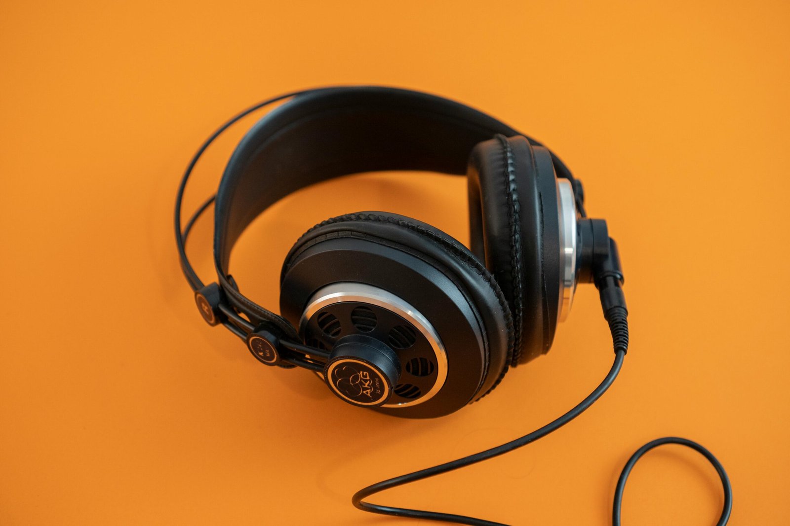 How to Choose the Right Voiceover for Your Brand (And Why It Matters More Than You Think) 1 Studio headphones on a bright background representing professional voiceover recording and audio production