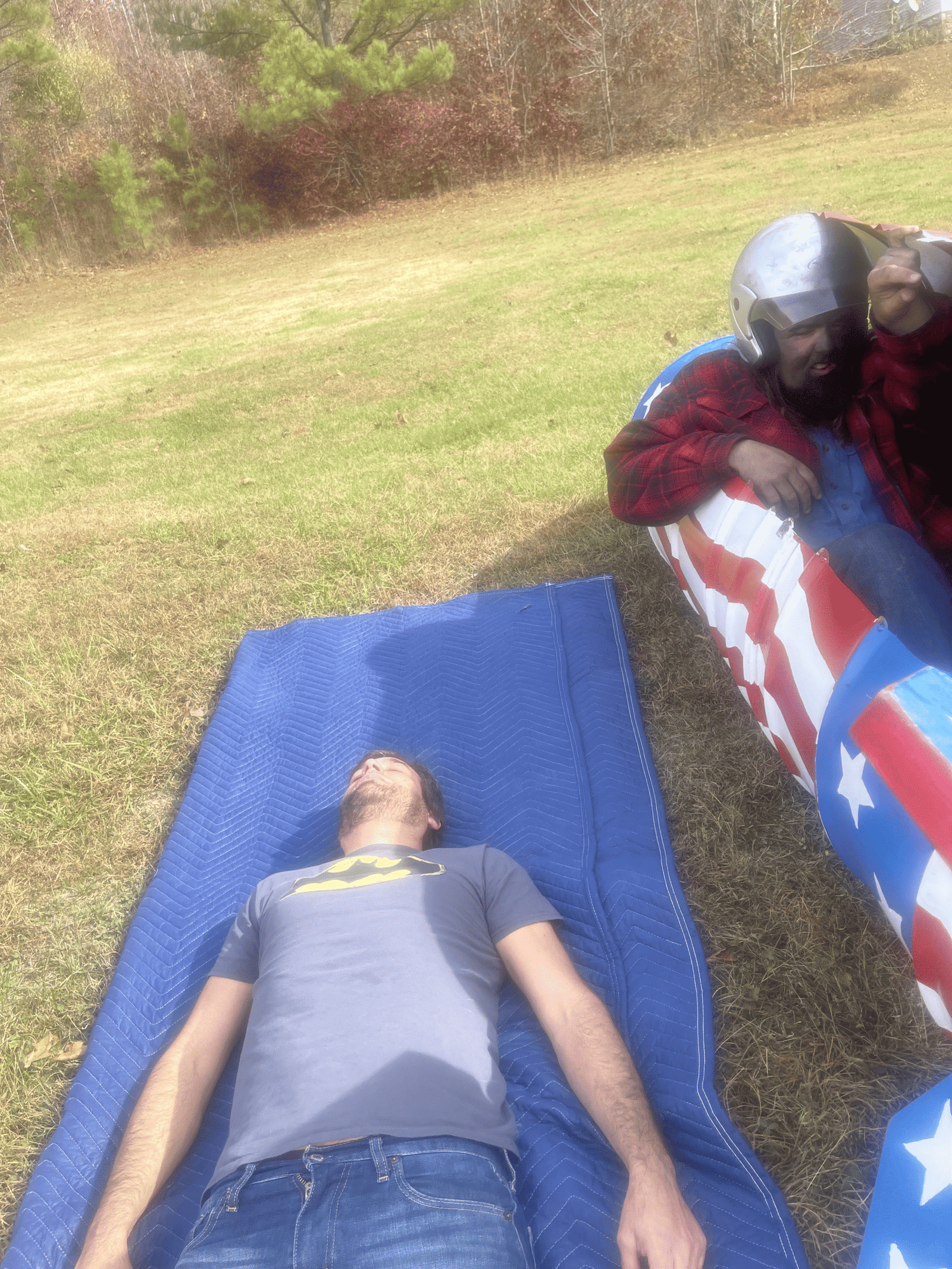 Behind-the-scenes photo of Alberto Luis standing in for the kill of Mark with Billy in the rocket next to him on set of Eddie’s Trailer Park