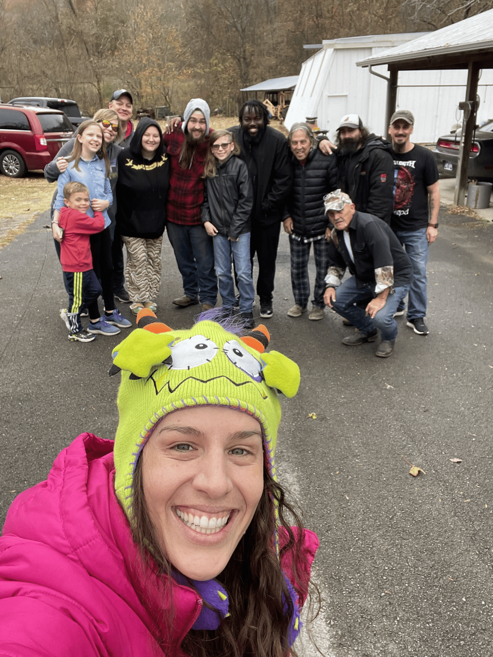Eddie’s Trailer Park cast and crew taking a group selfie on a cold day during filming.