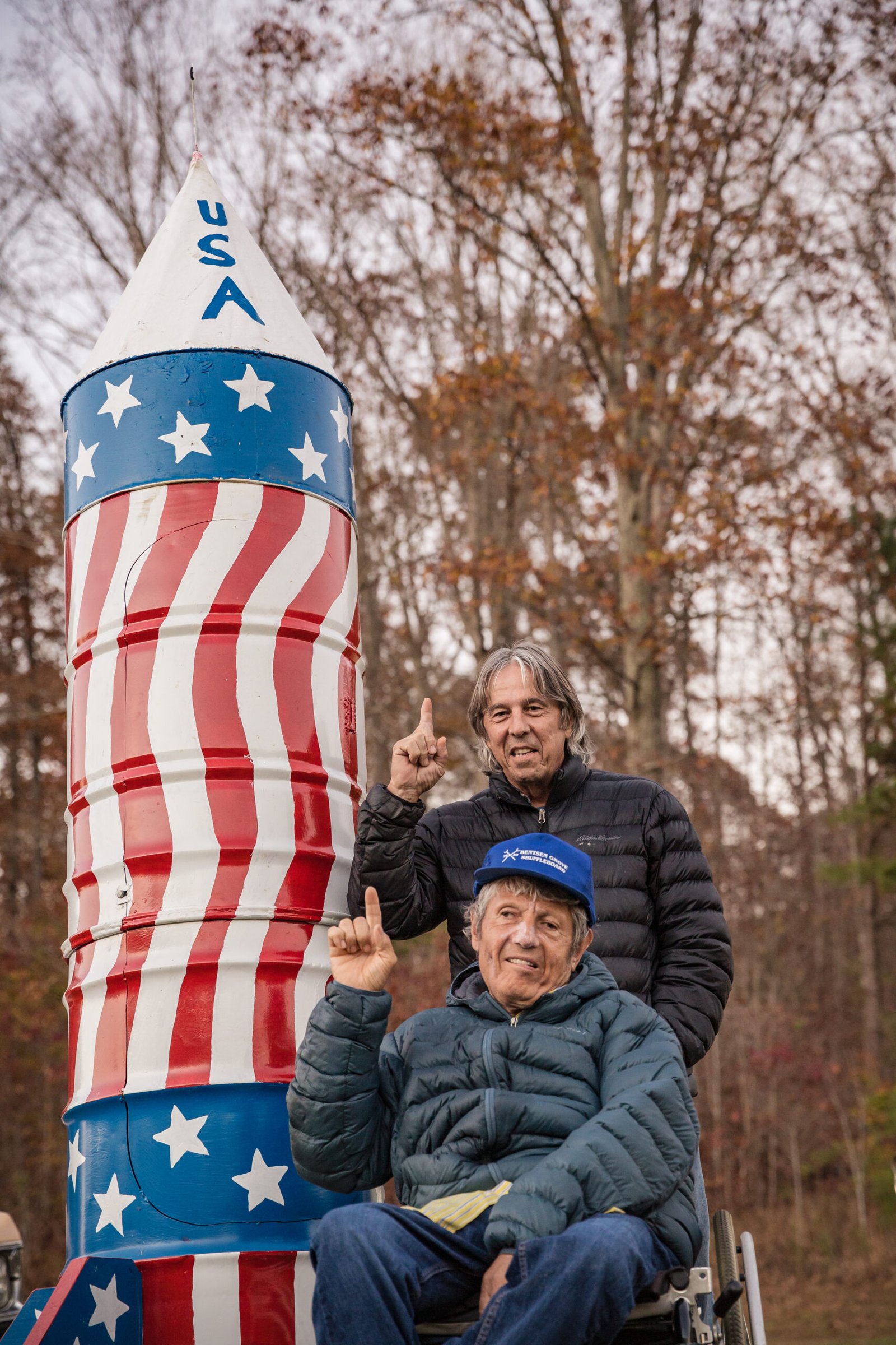 eddies trailer park behind the scenes picture of Tom and Joe Scott standing in front of the rocket built by Tom for the Eddie’s Trailer Park movie set