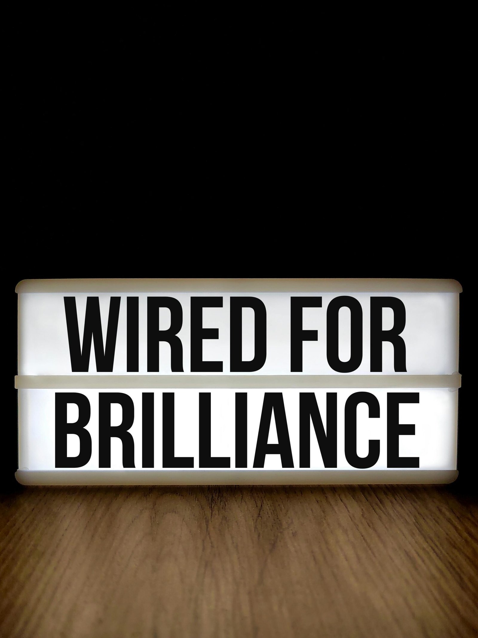 Graphic reading “Wired for Brilliance” representing the power of a positive performer mindset in the performing arts.