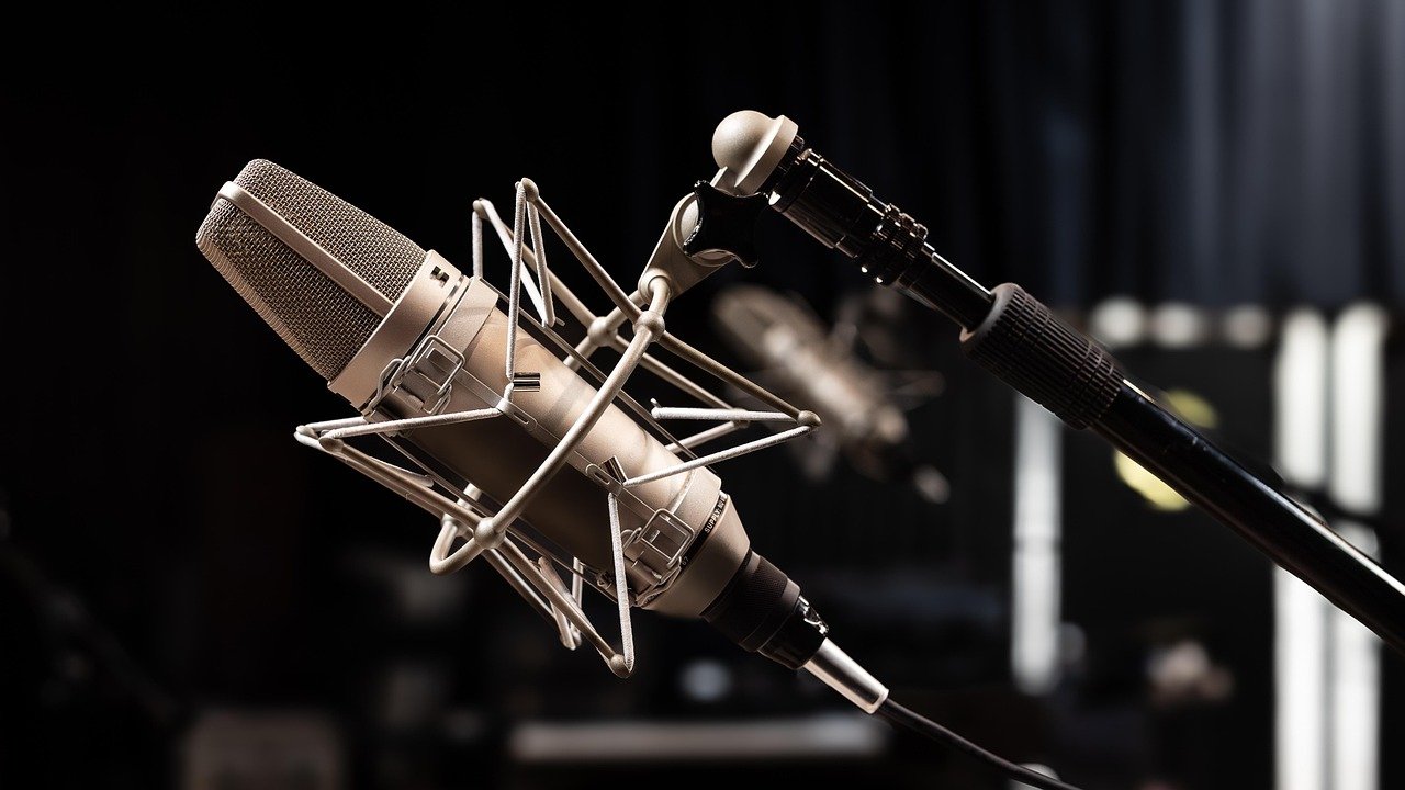 How to Hire the Right Female Voice Actor for Your Brand 2 Professional Neumann microphone used to hire female voice actor talent for broadcast quality voice over