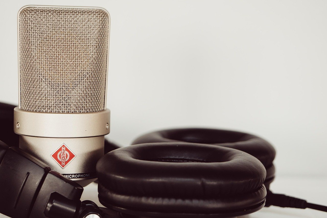 Microphone and headphones used for broadcast quality voiceover recording