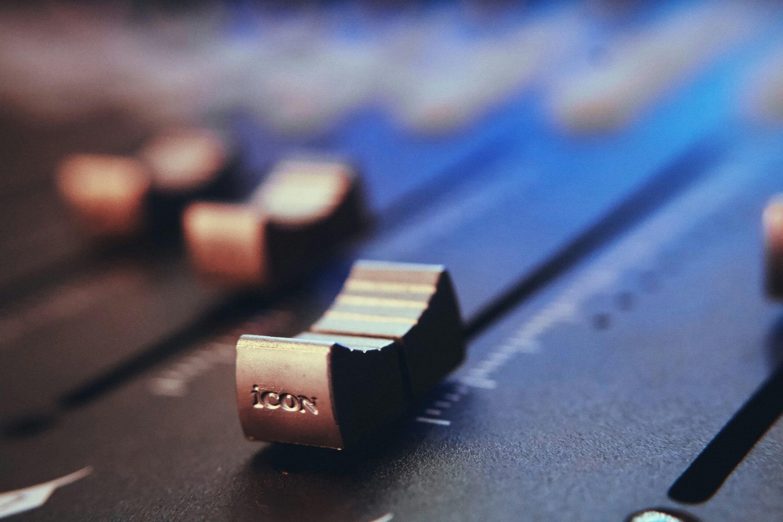 Sound board with level sliders used for broadcast quality voiceover recording