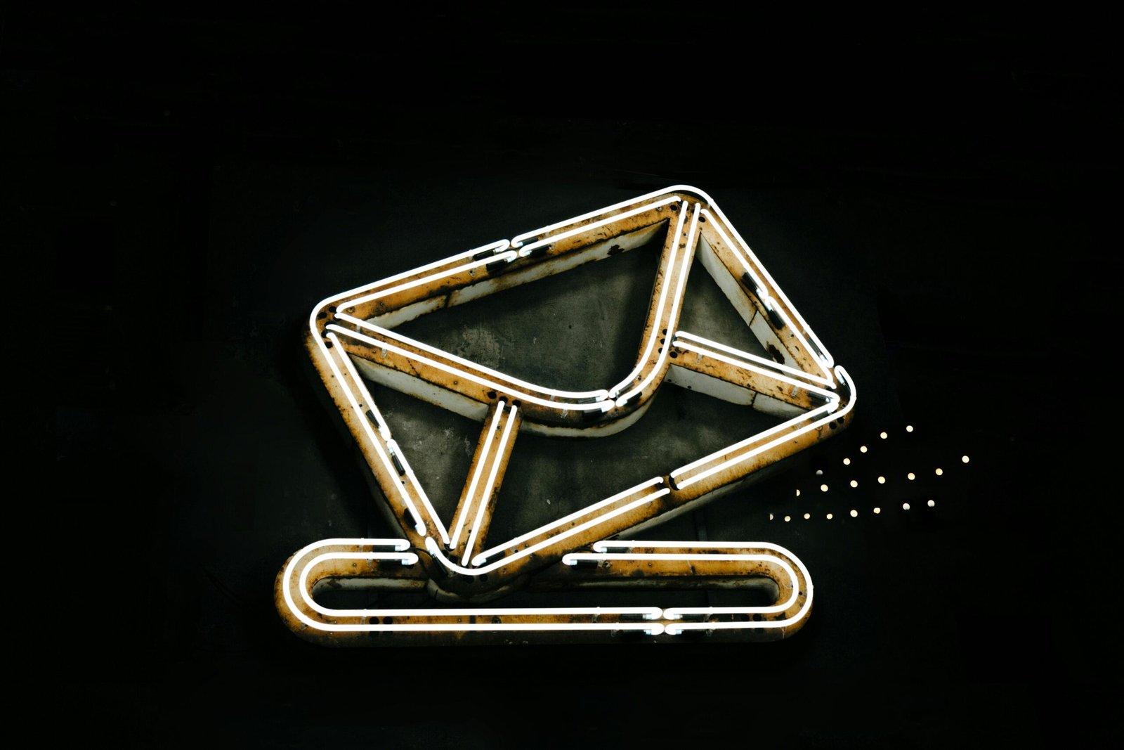 Neon email sign representing voiceover audio quality standards in professional communication and client delivery