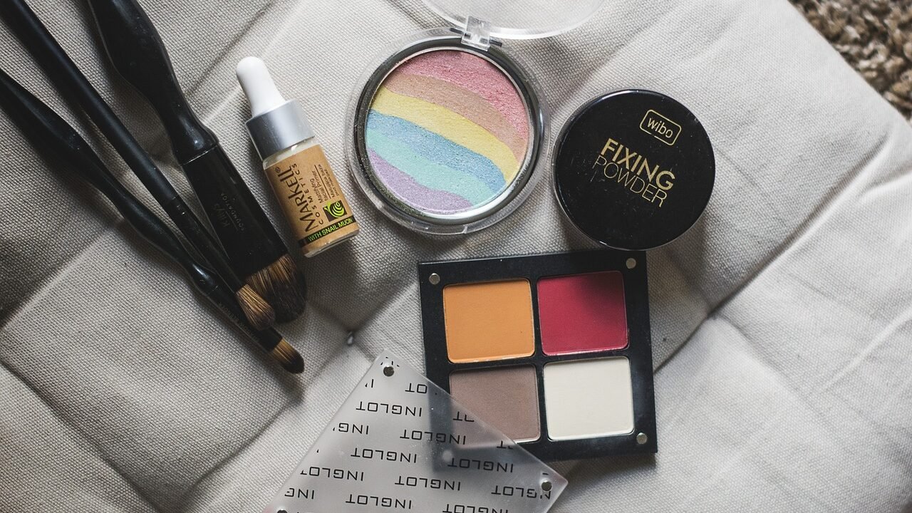 Makeup products arranged for a headshot session, highlighting preparation for professional actor headshots.