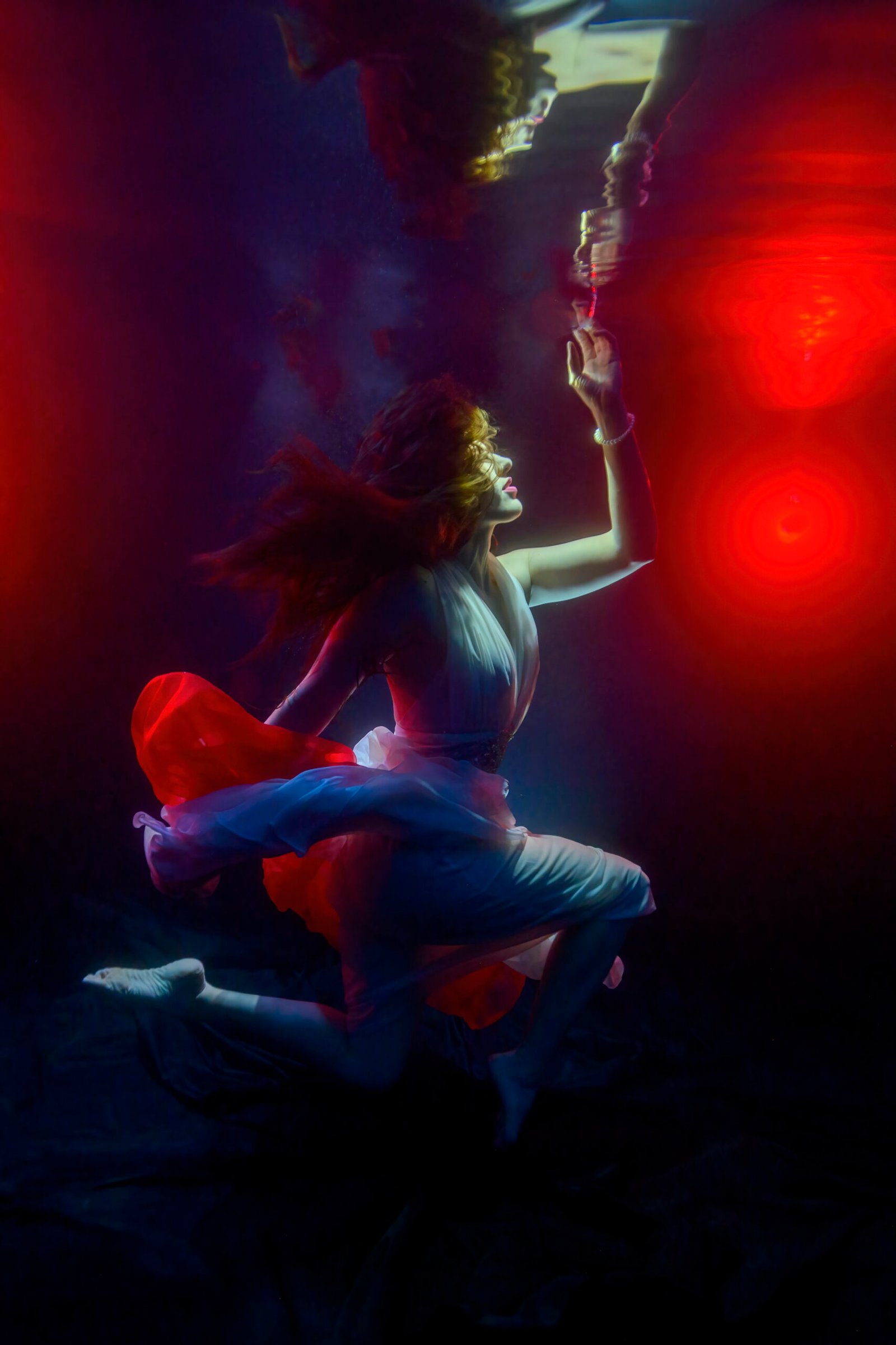 Shannon Scott professional underwater model for hire shannon scott red light scaled